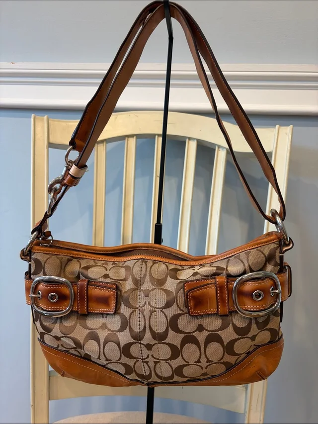 Coach Brown Sufflette Signature Canvas Shoulder Bag in brown|red|neutral Canvas from Poshmark, photo 1 of 1
