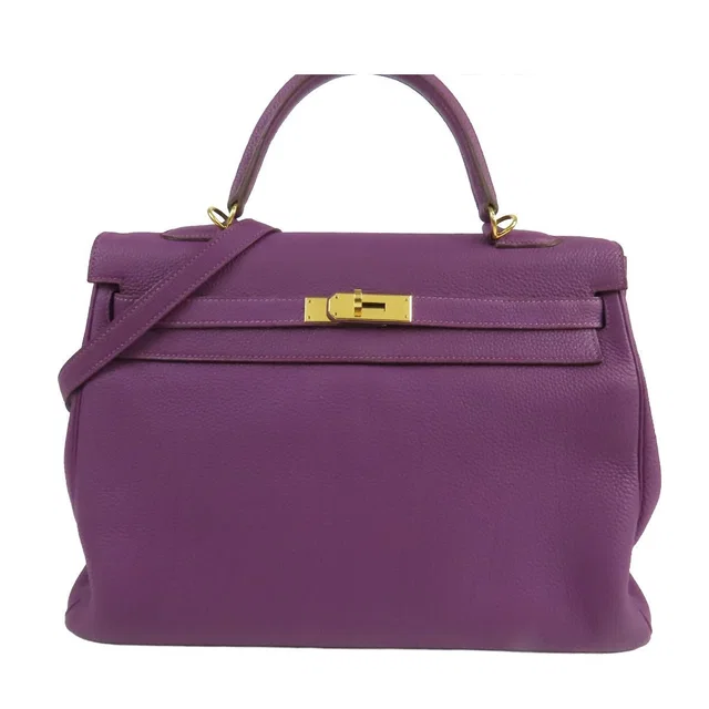 Hermès Kelly 35 Anemone Gold Togo Retourne 2-Way Shoulder Bag in Gold Togo leather from The Reluxe