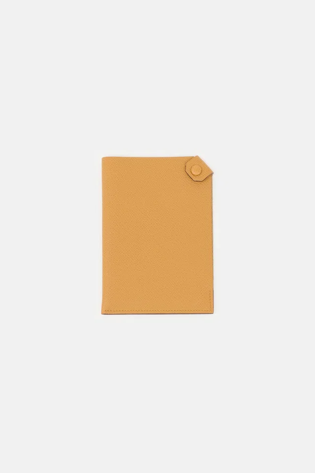 Hermès Gold Tarmac Epsom Passport Holder in Gold Epsom leather from VSP Consignment