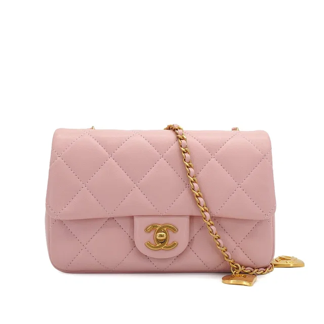 Chanel Mini Matelasse Heart Charm Chain Shoulder Bag Pink Lamb Skin Gold Hardware in Pink Leather from Luxury Promise