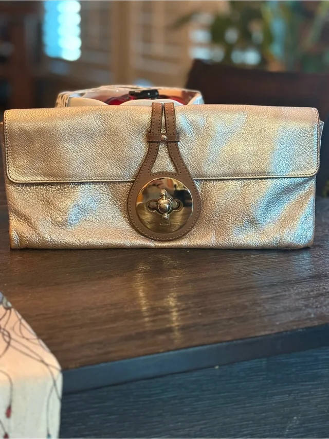 Chloé Clutch clutches in neutral|gold|brown Leather from Poshmark