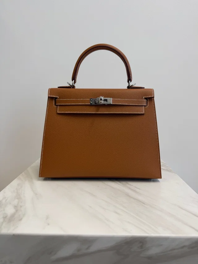 Hermès Kelly 25 Gold Epsom Palladium Hardware in Gold Epsom leather from Luxury Promise
