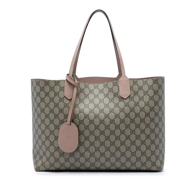 Beige Gucci Medium GG Supreme Reversible Tote in Beige Coated canvas from Designer Revival