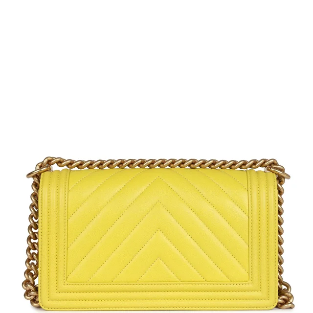 Chanel Medium Chevron Boy Bag Yellow Grained Calfskin Brushed Gold Hardware in Yellow Caviar leather from Madison Avenue Couture, photo 2 of 2