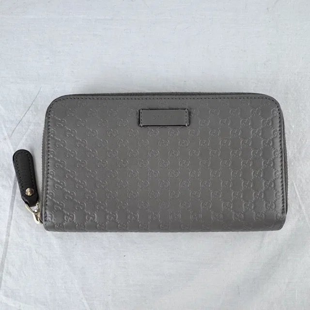 Gucci Grey Guccissima Leather Zip Around Wallet in Grey embossed, Leather, Metal from Reowned