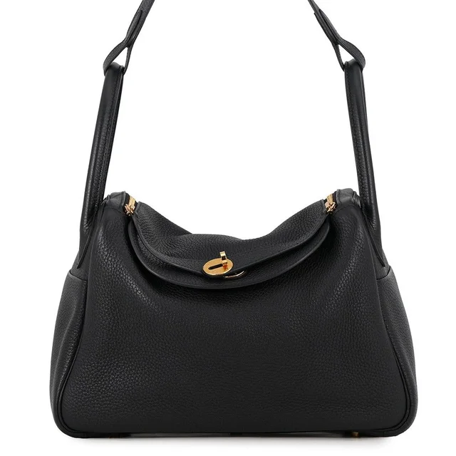 Hermès Lindy 30 Black Gold Taurillon Clemence 2-Way Shoulder Bag in Black Clemence leather from The Reluxe