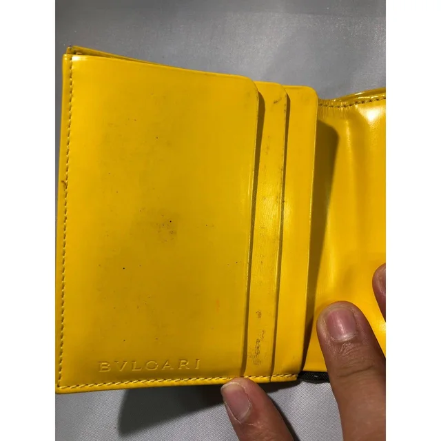 Bvlgari Women's Wallets - Black/Yellow in yellow|black from Depop, photo 5 of 9