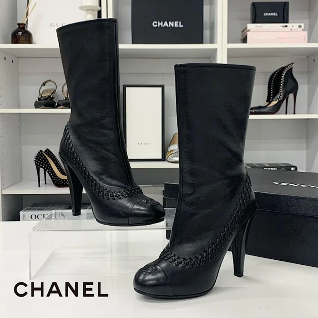 Chanel CC Logo Stitch Middle Boots Black in Black Leather from The Reluxe