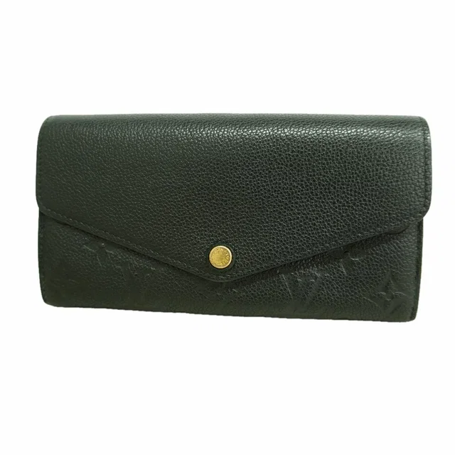 Louis Vuitton Wallet Monogram Empreinte Portefeuille Sarah Noir in Black from The Reluxe