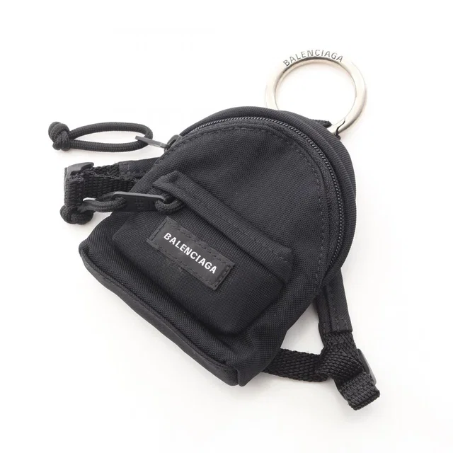 Balenciaga Charm Micro Backpack Black Nylon in Black Nylon from The Reluxe