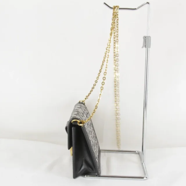 Louis Vuitton Jacquard Portefeuille Dauphine canvas leather shoulder bag in Black Canvas from LuxUness, photo 3 of 8