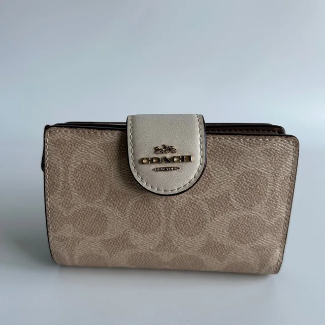 Coach Medium Corner Zip Wallet Khaki Chalk Canvas Leather Excellent in brown|white|neutral Canvas from Poshmark, photo 1 of 1
