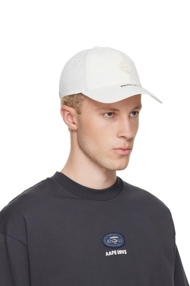 AAPE by A Bathing Ape Off-White AAPENOW Moonface Cap, photo 2 of 3 from SSENSE
