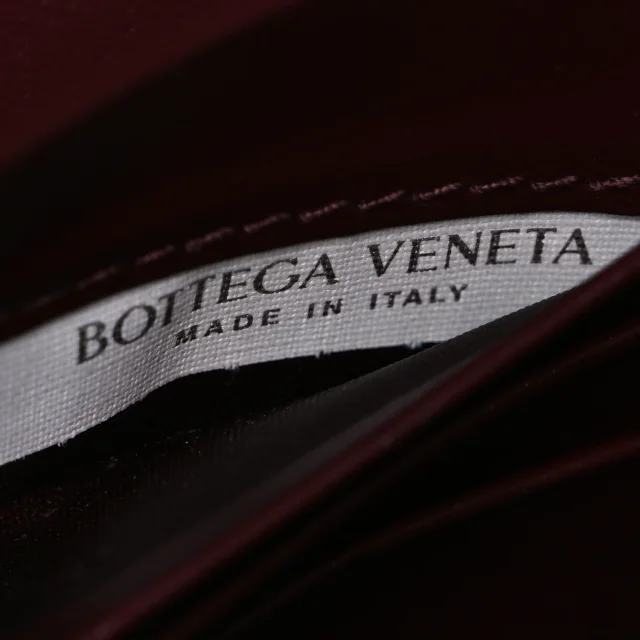 Bottega Veneta Nappa Intrecciato Long Andiamo Top Handle Clutch Barolo in Nappa leather from FASHIONPHILE, photo 7 of 11