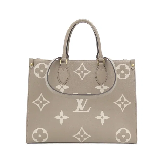 Louis Vuitton Bicolor Monogram Empreinte On The Go MM Bag from The Reluxe