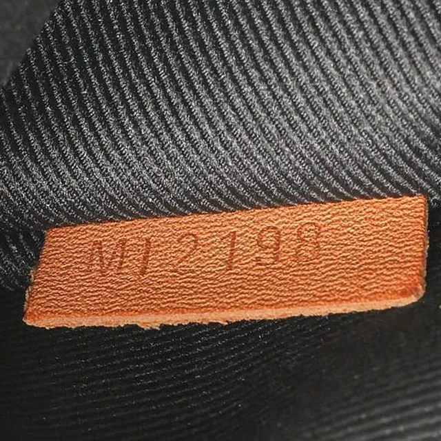 Louis Vuitton Monogram Bum Bag in Coated canvas from A Retro Tale, photo 10 of 10