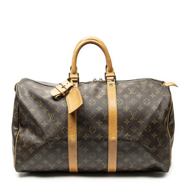 Louis Vuitton Keepall Brown Monogram Canvas in Brown Coated canvas from The Reluxe