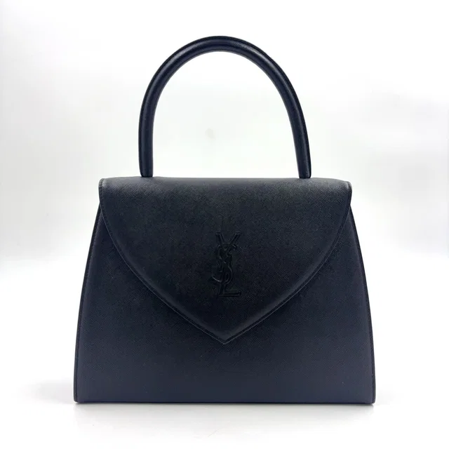 Saint Laurent Logo Embossed Leather Black Handbag Gold in Black Leather from The Reluxe