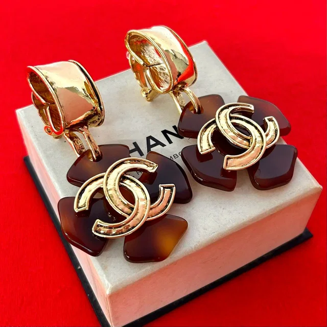 Chanel 94P With Rice CC Logo Marble Plastic Earrings Gold Brown in Brown from The Reluxe