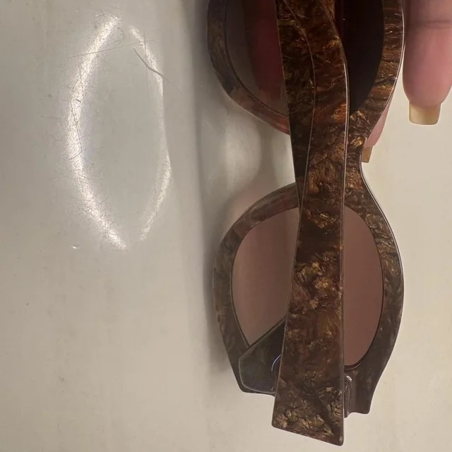 Loewe Women's Sunglasses - Brown in brown|red from Depop, photo 1 of 1