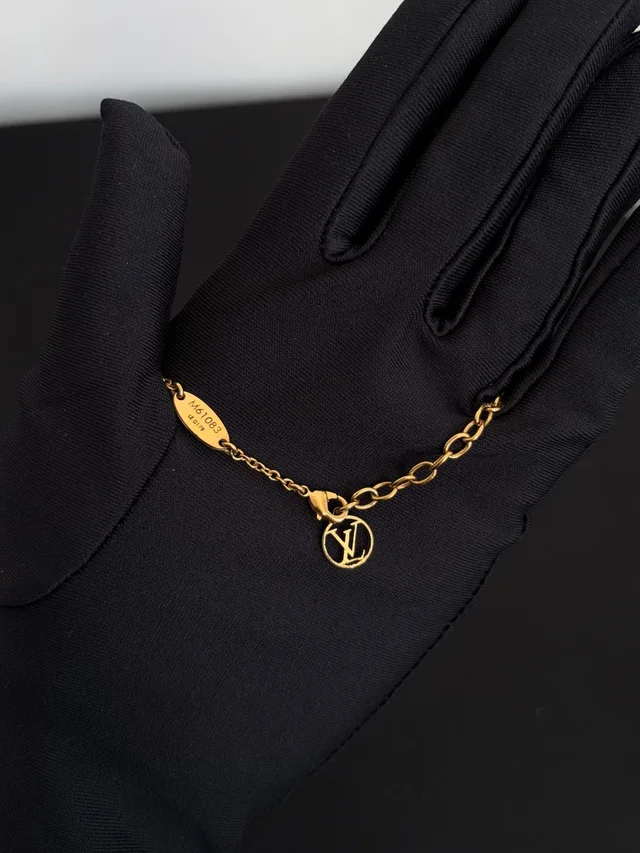 Louis Vuitton Gold Essential V Necklace in Gold from Luxury Promise, photo 3 of 4