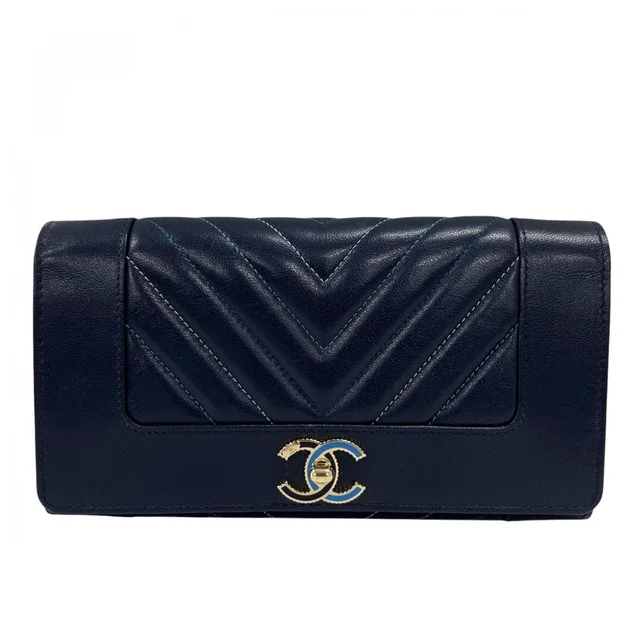 Chanel Wallet Mademoiselle Flap Blue Logo in Blue Lambskin from The Reluxe