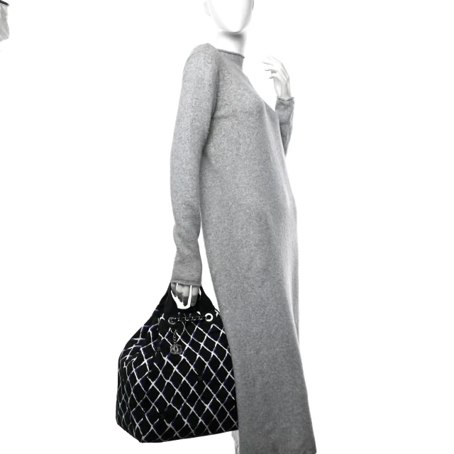 Chanel Printed Airline Drawstring Bag Black Blue in Black Canvas from FASHIONPHILE, photo 3 of 12