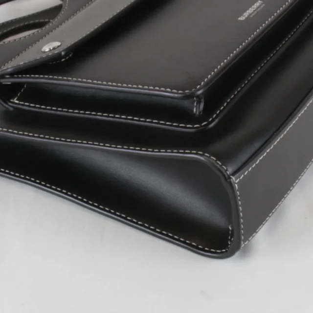 Burberry Mini Pocket Bag Leather Handbag in Black Leather from LuxUness, photo 4 of 9
