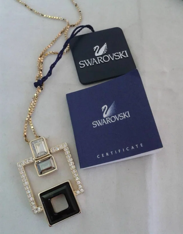 Swarovski square diamante pendant on a gold coloured chain, new in box in Gold from Oxfam Online Shop