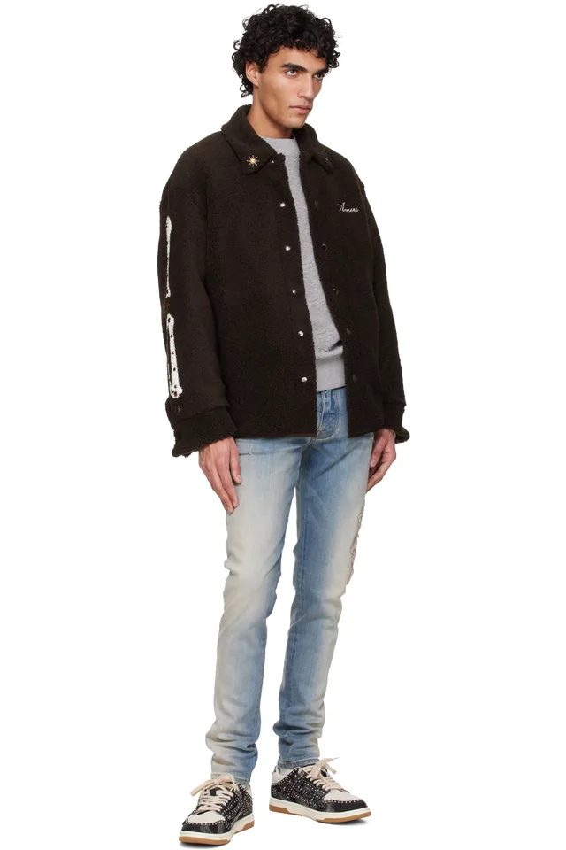 AMIRI Blue MA Quad Applique Skinny Jeans, photo 4 of 4 from SSENSE