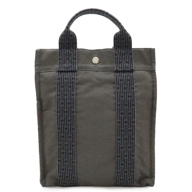 Hermès Herline Sac A Dos PM Backpack Shoulder Bag Canvas Gray in Grey Canvas from The Reluxe