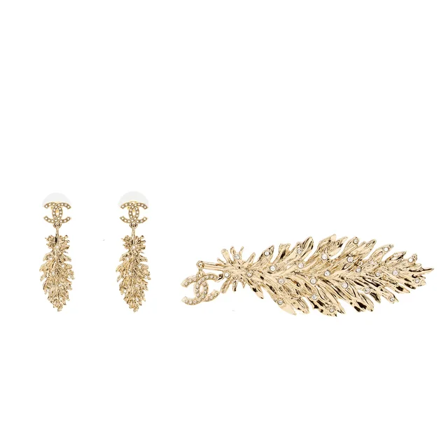 Chanel CC Feather Brooch And Earrings Crystal Gold Tone (Sell In Set) in Gold from EMIER
