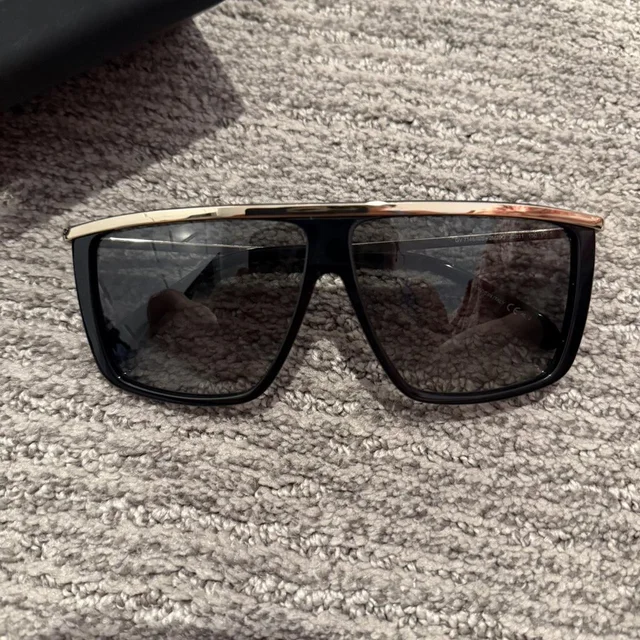 Givenchy Women's Sunglasses - Black/Brown in red|brown|black from Depop, photo 1 of 1