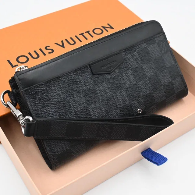 Louis Vuitton Damier Graphite Zippy Dragonne Wallet Black in Black from The Reluxe