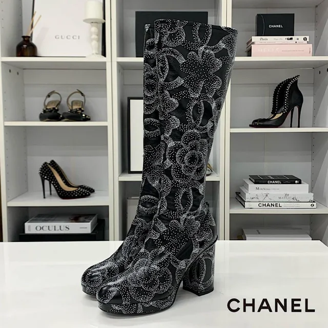 Chanel Calfskin CC Logo Camellia Clover Heart Charm Boots in Calfskin from The Reluxe