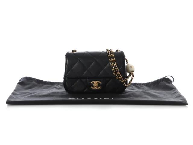 Chanel Mini Black Quilted Aged Calfskin Double Pearl Flap in Black Calfskin from Ann's Fabulous Finds, photo 2 of 10