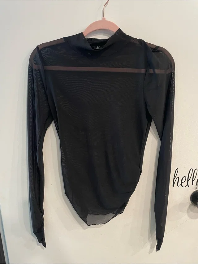 Christian Lacroix Sheer Black Long-Sleeve Mock Neck Top in black from Poshmark