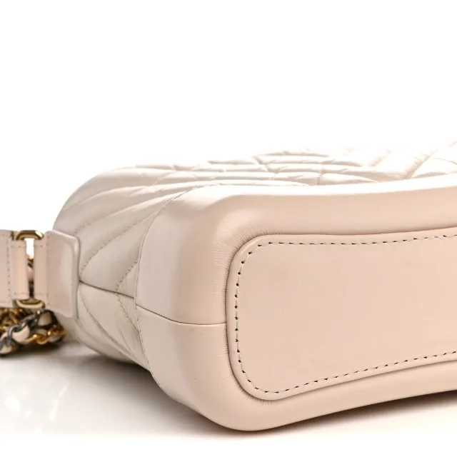 Chanel Aged Calfskin Chevron Quilted Small Gabrielle Hobo Ivory in White Calfskin from FASHIONPHILE, photo 9 of 12