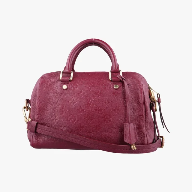 Louis Vuitton Speedy Bandouliere 25 Aurore Monogram Empreinte Handbag from The Reluxe