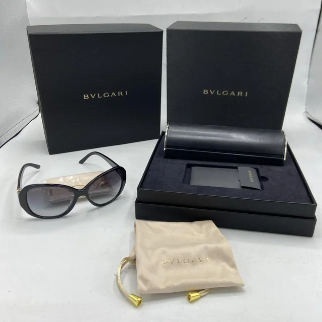 Bvlgari Women's Cat eye Sunglasses - Black in black from Depop, photo 1 of 1