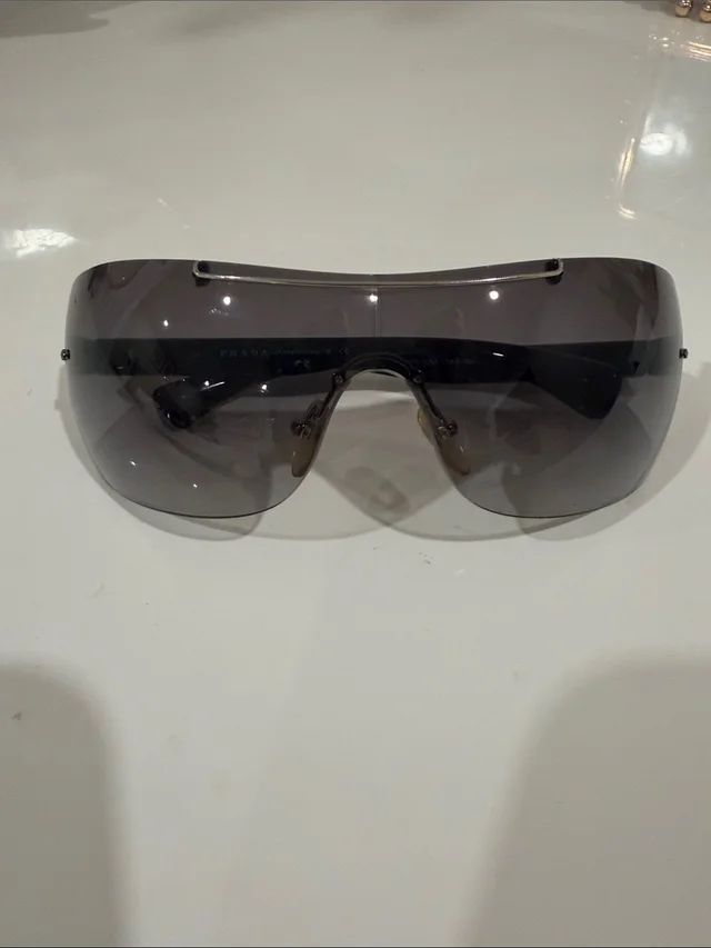 Prada Shield Sunglasses In Smoke in gray from Poshmark