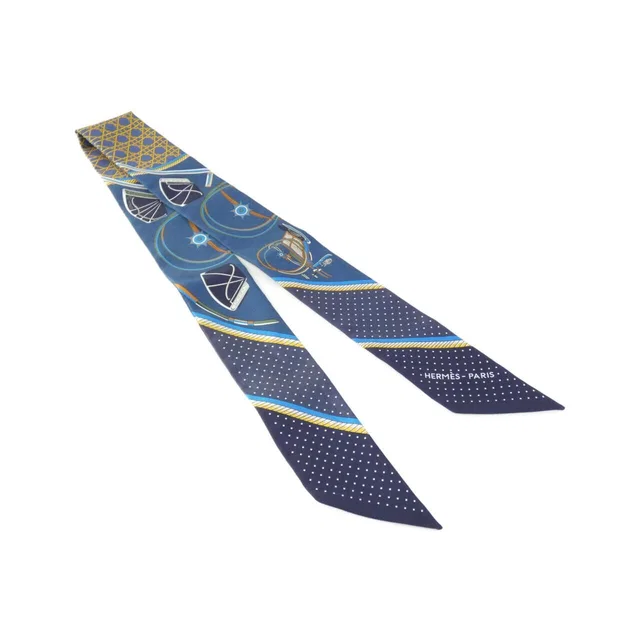 Hermès les Voitures Transformation Twilly Scarf in Silk from The Reluxe