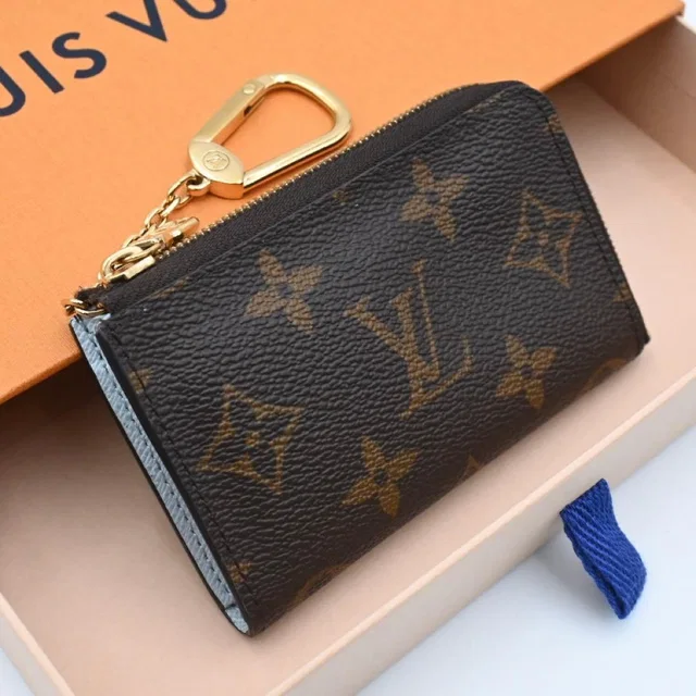 Louis Vuitton Monogram Porte Cles Noah Coin Purse Key Case Brown in Brown from The Reluxe