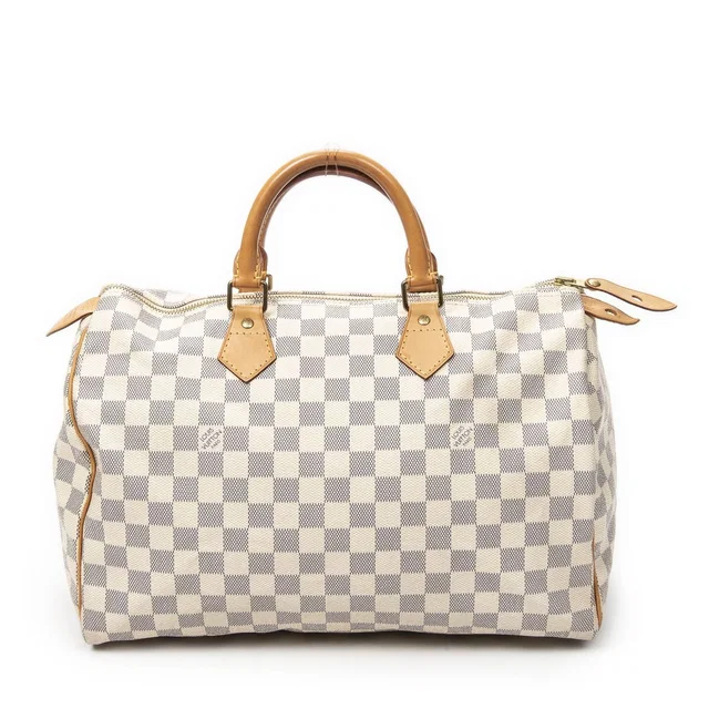 Louis Vuitton Speedy Ivory Damier Azur Handbag in White from The Reluxe