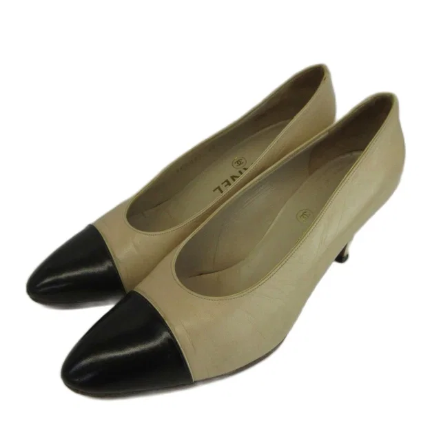 Chanel Pumps Leather Cap Toe Middle Heels Bicolor Beige Black in Black Leather from The Reluxe
