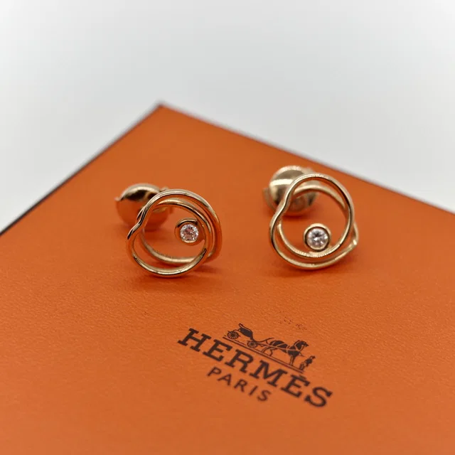 Hermès 18K gold diamond Vertige Coeur heart stud earrings from Popchill