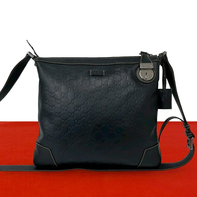Gucci With Key Guccissima GG Patter Leather Shoulder Bag Cross Dark Navy in Navy Leather from The Reluxe