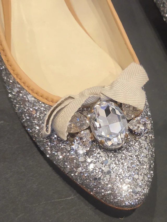 Miu Miu Silver Glitter Pointed Flat With Crystal Bow $386 in silver|neutral|gray|brown from Poshmark