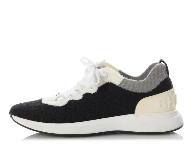 Chanel Black and White Fabric Sneakers in Black from Ann's Fabulous Finds