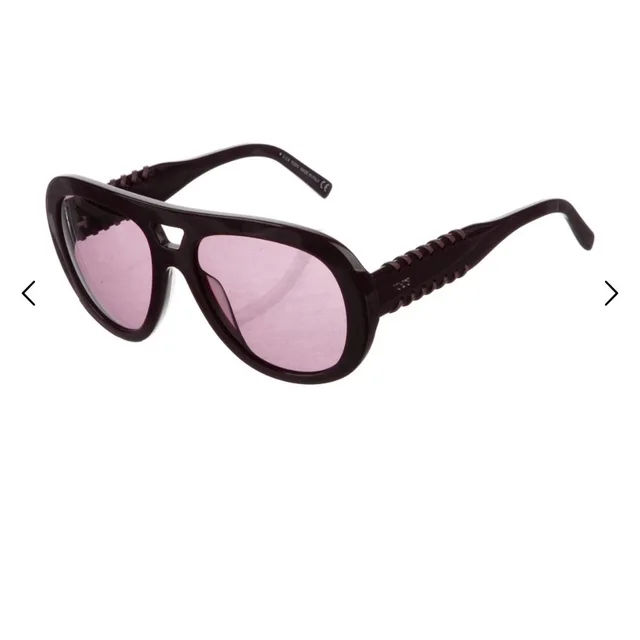 Tod's Aviator Sunglasses in black from Poshmark